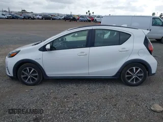 2018 Toyota Prius One with VIN JTDKDTB35J1615449, listed as a IAAI auction lot 42041928 with 59,870 mi miles and . Bid and sale history available at DreamBid. Image 14.