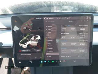 2021 Tesla Model Y Long Range with VIN 5YJYGDEE5MF203175, listed as a IAAI auction lot 41758334 with 63,387 mi miles and . Bid and sale history available at DreamBid. Image 7.