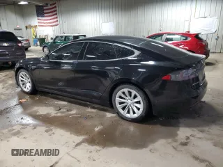 2016 Tesla Model S 70 with VIN 5YJSA1E13GF157708, listed as a Copart auction lot 57911925 with 131,606 mi miles and Clean title. Bid and sale history available at DreamBid. Image 2.
