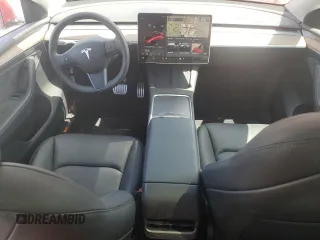 2024 Tesla Model Y Performance with VIN 7SAYGDEF1RF052175, listed as a Copart auction lot 51743895 with 4,869 mi miles and Salvage Title. Bid and sale history available at DreamBid. Image 8.