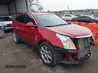 2013 Cadillac SRX Premium Collection z VIN 3GYFNEE3XDS604238, wystawiony jako IAAI lot #41949780 z przebiegiem 71 563 mil mil oraz . Historia ofert i sprzedaży dostępna na DreamBid. Obrazek 1.