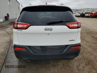 2016 Jeep Cherokee 75th Anniversary с VIN 1C4PJLCS5GW201491, выставлен на аукционе Copart как лот 83811924 с пробегом 114 078 миль миль и Списание • Salvage title. История ставок и продаж доступна на DreamBid. Изображение 6.