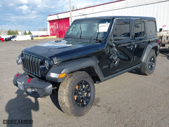 2021 Jeep Wrangler Unlimited Willys with VIN 1C4HJXDM0MW683276, listed as a IAAI auction lot 41896423 with 70,935 mi miles. Bid and sale history available at carsss.com. Image 18.