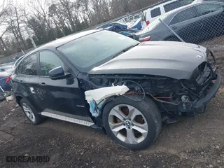 2011 BMW X6 35i with VIN 5UXFG2C58BLX08487, listed as a IAAI auction lot 41627394 with 999,999 mi miles. Bid and sale history available at carsss.com. Image 12.