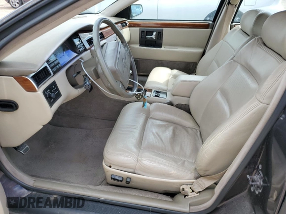 1992 Cadillac Seville z VIN 1G6KY53BXNU804126, wystawiony jako Copart lot #69219394 z przebiegiem 100 647 mil mil oraz Czysty tytuł • Clean title. Historia ofert i sprzedaży dostępna na DreamBid. Obrazek 7.