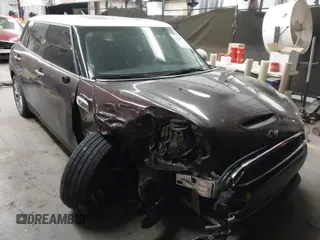 2018 MINI Clubman Cooper S z VIN WMWLN9C55J2E50761, wystawiony jako IAAI lot #41469770 z przebiegiem 189 592 mil mil oraz . Historia ofert i sprzedaży dostępna na DreamBid. Obrazek 1.