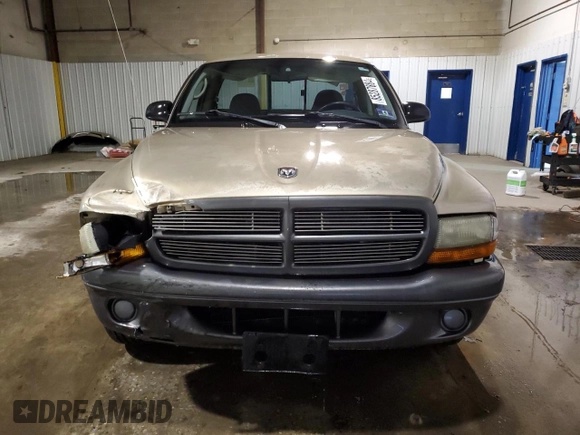 2002 Dodge Dakota with VIN 1B7FL16X82S590323, listed as a Copart auction lot 85287884 with 61,722 mi miles and Salvage Title. Bid and sale history available at carsss.com. Image 5.
