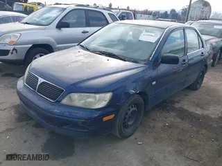 2003 Mitsubishi Lancer ES with VIN JA3AJ26E13U010757, listed as a IAAI auction lot 41450627 with 232,122 mi miles. Bid and sale history available at carsss.com. Image 2.