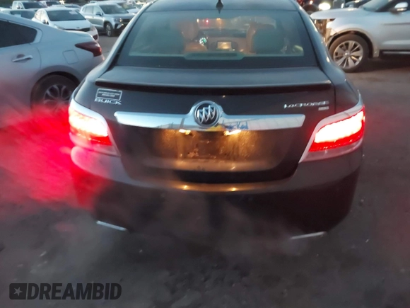 2011 Buick LaCrosse CXS with VIN 1G4GE5GD1BF158297, listed as a IAAI auction lot 41271158 with 104,659 mi miles and . Bid and sale history available at DreamBid. Image 16.