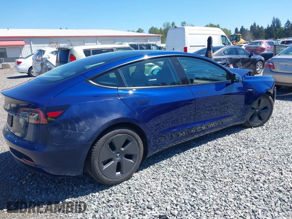 2023 Tesla Model 3 z VIN 5YJ3E1EA9PF639141, wystawiony jako IAAI lot #42167773 z przebiegiem 57 459 mil mil oraz . Historia ofert i sprzedaży dostępna na DreamBid. Obrazek 4.