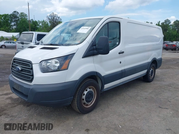 2016 Ford Transit Cargo z VIN 1FTYE1ZM9GKB14741, wystawiony jako IAAI lot #42165906 z przebiegiem 162 976 mil mil oraz . Historia ofert i sprzedaży dostępna na DreamBid. Obrazek 2.