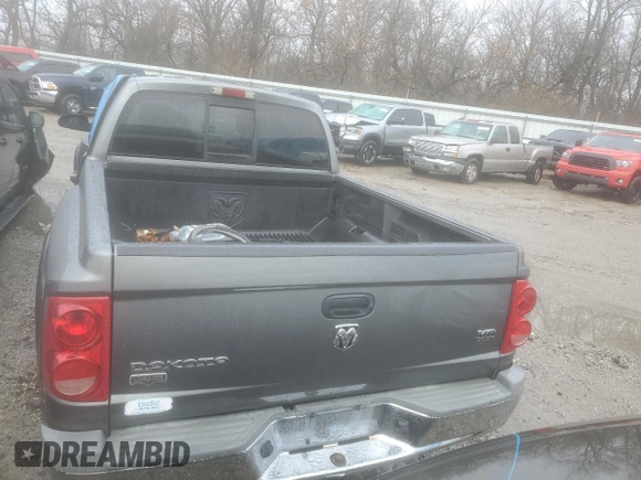 2005 Dodge Dakota Laramie with VIN 1D7HW58N25S204671, listed as a Copart auction lot 83838314 with 122,540 mi miles and Salvage Title. Bid and sale history available at DreamBid. Image 6.