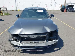 2012 BMW 3 Series 335i with VIN WBA3A9C5XCF077642, listed as a IAAI auction lot 42385611 with 119,251 mi miles and . Bid and sale history available at DreamBid. Image 12.