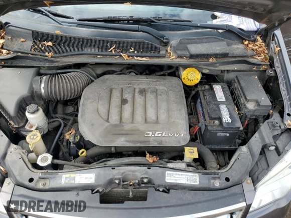 2015 Chrysler Town & Country Touring with VIN 2C4RC1BG7FR526106, listed as a Copart auction lot 54184395 with 75,417 mi miles and Salvage Title. Bid and sale history available at DreamBid. Image 12.