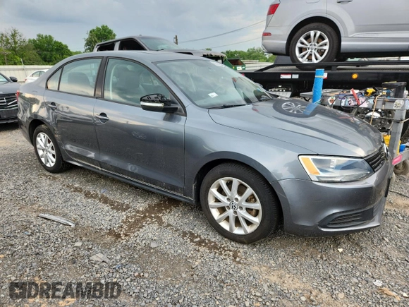 2011 Volkswagen Jetta SE with VIN 3VWDZ7AJ7BM318475, listed as a Copart auction lot 63148335 with 125,266 mi miles and Clean title. Bid and sale history available at DreamBid. Image 4.