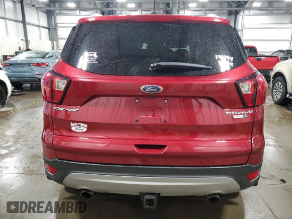 2019 Ford Escape Titanium with VIN 1FMCU9J9XKUA41715, listed as a Copart auction lot 57483725 with 30,644 mi miles and Salvage title. Bid and sale history available at DreamBid. Image 6.