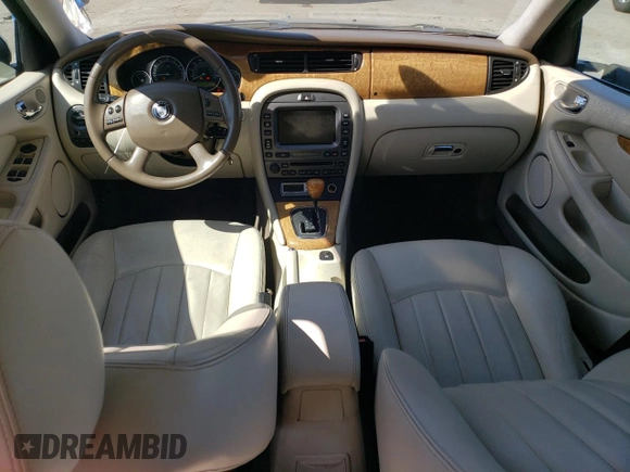 2008 Jaguar X-Type z VIN SAJWA51A38WJ36788, wystawiony jako Copart lot #73103604 z przebiegiem 192 416 mil mil oraz Szkoda całkowita • Salvage title. Historia ofert i sprzedaży dostępna na DreamBid. Obrazek 8.