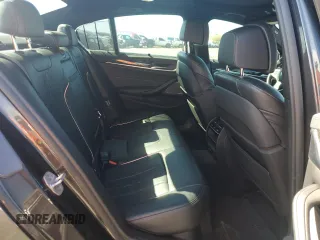 2019 BMW 5 Series M550i xDrive with VIN WBAJB9C57KB289036, listed as a Copart auction lot 86292134 with 28,103 mi miles and Salvage title. Bid and sale history available at DreamBid. Image 10.