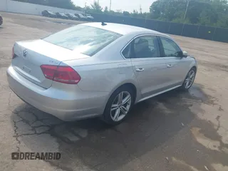 2014 Volkswagen Passat SE with VIN 1VWBT7A37EC039074, listed as a IAAI auction lot 42439583 with 109,654 mi miles and . Bid and sale history available at DreamBid. Image 4.
