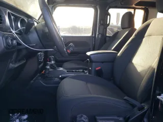 2023 Jeep Wrangler Sport S with VIN 1C4HJXDG3PW646818, listed as a Copart auction lot 77016834 with 12,118 mi miles and Clean Title. Bid and sale history available at DreamBid. Image 7.