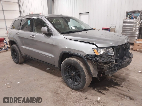 2015 Jeep Grand Cherokee Laredo with VIN 1C4RJFAG4FC797069, listed as a IAAI auction lot 41435299 with 146,755 mi miles. Bid and sale history available at carsss.com. Image 1.
