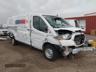 2023 Ford Transit Cargo with VIN 1FTYE1Y82PKB92413, listed as a IAAI auction lot 41702808 with 20,144 mi miles and . Bid and sale history available at DreamBid. Image 1.