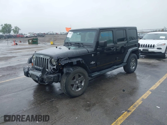 2013 Jeep Wrangler Unlimited Sport z VIN 1C4BJWDGXDL596450, wystawiony jako IAAI lot #42323862 z przebiegiem 114 105 mil mil oraz . Historia ofert i sprzedaży dostępna na DreamBid. Obrazek 2.