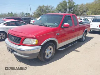 2000 Ford F-150 XL with VIN 1FTRX17L7YKAH2091, listed as a IAAI auction lot 41863588 with 1 mi miles. Bid and sale history available at carsss.com. Image 2.