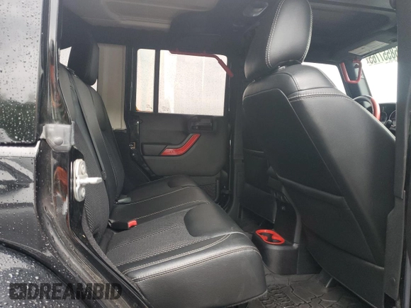 2015 Jeep Wrangler Unlimited Sahara with VIN 1C4BJWEG6FL643460, listed as a Copart auction lot 58557765 with 130,181 mi miles and Salvage title. Bid and sale history available at DreamBid. Image 10.