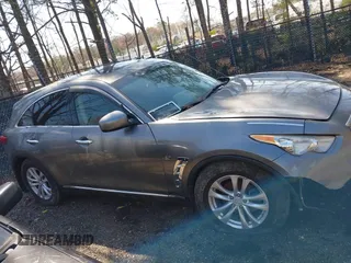 2014 Infiniti QX70 с VIN JN8CS1MW9EM413406, выставлен на аукционе IAAI как лот 41909387 с пробегом 123 957 миль миль и . История ставок и продаж доступна на DreamBid. Изображение 13.