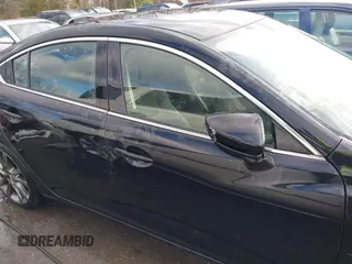 2016 Mazda 6 i Grand Touring with VIN JM1GJ1W54G1454115, listed as a IAAI auction lot 41203298 with 104,632 mi miles and . Bid and sale history available at DreamBid. Image 14.