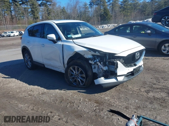 2019 Mazda CX-5 Grand Touring with VIN JM3KFBDM2K0672720, listed as a IAAI auction lot 41751196 with 51,632 mi miles and . Bid and sale history available at carsss.com. Image 1.