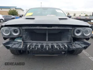 2015 Dodge Challenger R/T with VIN 2C3CDZAT5FH710566, listed as a IAAI auction lot 42042697 with 97,206 mi miles and . Bid and sale history available at DreamBid. Image 6.