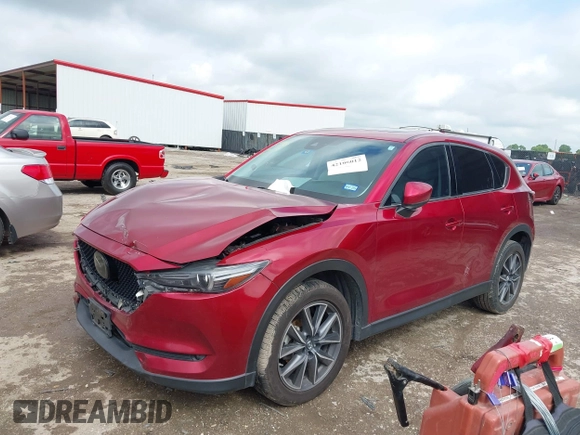 2018 Mazda CX-5 Grand Touring with VIN JM3KFADM7J1357401, listed as a IAAI auction lot 42106012 with 119,420 mi miles and . Bid and sale history available at DreamBid. Image 17.
