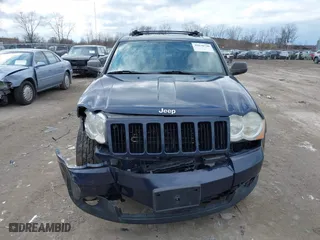 2010 Jeep Grand Cherokee Laredo with VIN 1J4PR4GK5AC138498, listed as a IAAI auction lot 41870740 with 130,551 mi miles. Bid and sale history available at carsss.com. Image 12.