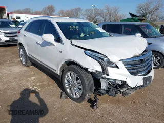2017 Cadillac XT5 Premium Luxury AWD z VIN 1GYKNERS3HZ284561, wystawiony jako IAAI lot #41887147 z przebiegiem 119 189 mil mil oraz . Historia ofert i sprzedaży dostępna na DreamBid. Obrazek 1.