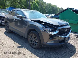 2024 Mazda CX-30 S Select Sport with VIN 3MVDMBBM9RM641576, listed as a IAAI auction lot 42541454 with 40,271 mi miles and . Bid and sale history available at DreamBid. Image 1.