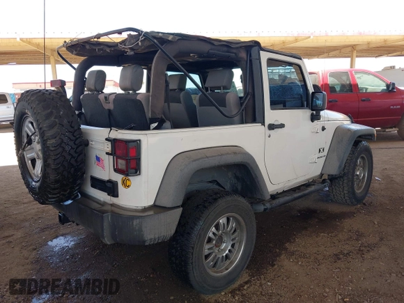 2007 Jeep Wrangler X with VIN 1J4FA24137L128418, listed as a IAAI auction lot 42317921 with 148,412 mi miles and . Bid and sale history available at DreamBid. Image 4.