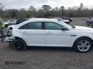 2016 Ford Taurus SE z VIN 1FAHP2D83GG131408, wystawiony jako IAAI lot #41552981 z przebiegiem 151 295 mil mil oraz . Historia ofert i sprzedaży dostępna na DreamBid. Obrazek 14.
