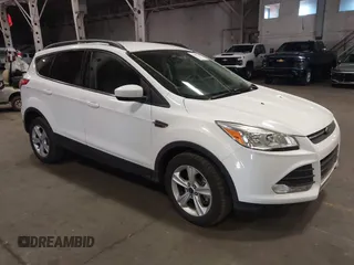 2014 Ford Escape SE with VIN 1FMCU9G90EUD81774, listed as a IAAI auction lot 42067148 with 115,277 mi miles. Bid and sale history available at carsss.com. Image 1.