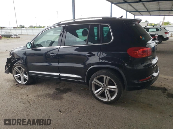 2015 Volkswagen Tiguan R-Line with VIN WVGAV7AX3FW064500, listed as a Copart auction lot 54745215 with 103,406 mi miles and Salvage Title. Bid and sale history available at DreamBid. Image 2.