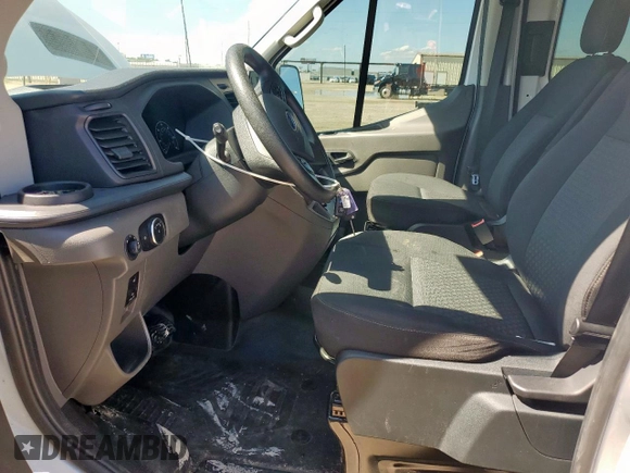 2023 Ford Transit Cargo z VIN 1FTBR3X84PKB10219, wystawiony jako Copart lot #60219385 z przebiegiem 83 059 mil mil oraz Szkoda całkowita • Salvage title. Historia ofert i sprzedaży dostępna na DreamBid. Obrazek 7.