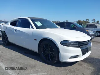 2015 Dodge Charger RT z VIN 2C3CDXCT2FH777143, wystawiony jako IAAI lot #42303147 z przebiegiem 129 267 mil mil oraz . Historia ofert i sprzedaży dostępna na DreamBid. Obrazek 1.