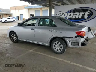 2010 Toyota Corolla with VIN 1NXBU4EE1AZ206765, listed as a Copart auction lot 60996215 with 196,623 mi miles and Salvage title. Bid and sale history available at DreamBid. Image 2.