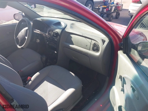 2002 Kia Rio with VIN KNADC123126182360, listed as a IAAI auction lot 41526651 with 82,052 mi miles. Bid and sale history available at carsss.com. Image 5.