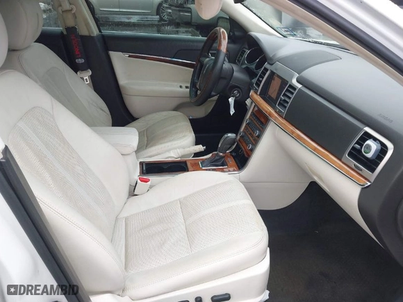 2012 Lincoln MKZ with VIN 3LNHL2JCXCR813912, listed as a IAAI auction lot 41560299 with 153,806 mi miles. Bid and sale history available at carsss.com. Image 5.
