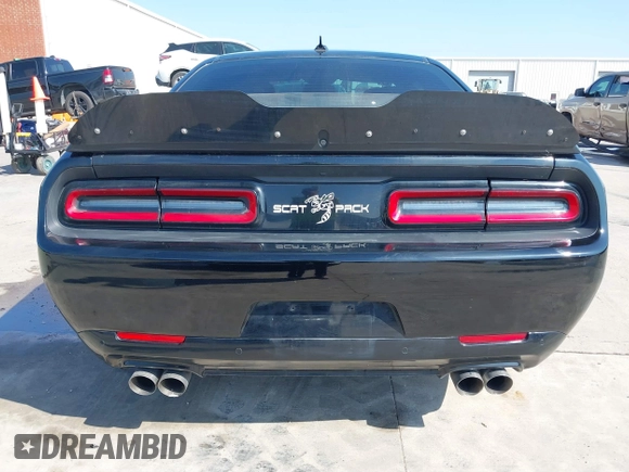 2021 Dodge Challenger R/T Scat Pack z VIN 2C3CDZFJXMH509833, wystawiony jako IAAI lot #41516858 z przebiegiem 66 880 mil mil oraz . Historia ofert i sprzedaży dostępna na DreamBid. Obrazek 16.
