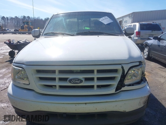 2002 Ford F-150 XL with VIN 1FTRX17L32NA13159, listed as a IAAI auction lot 41653814 with 435,395 mi miles. Bid and sale history available at carsss.com. Image 12.