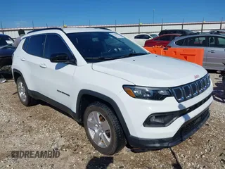 2022 Jeep Compass Latitude with VIN 3C4NJDBB2NT236443, listed as a IAAI auction lot 42030411 with 57,223 mi miles and . Bid and sale history available at DreamBid. Image 1.