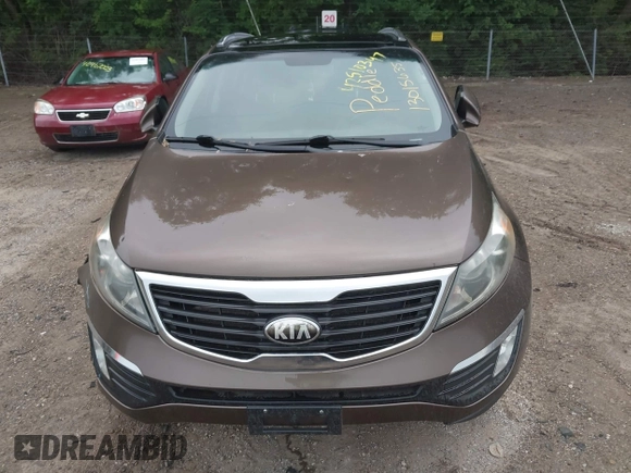 2013 Kia Sportage EX z VIN KNDPC3A28D7449821, wystawiony jako IAAI lot #42510347 z przebiegiem 194 084 mil mil oraz . Historia ofert i sprzedaży dostępna na DreamBid. Obrazek 12.